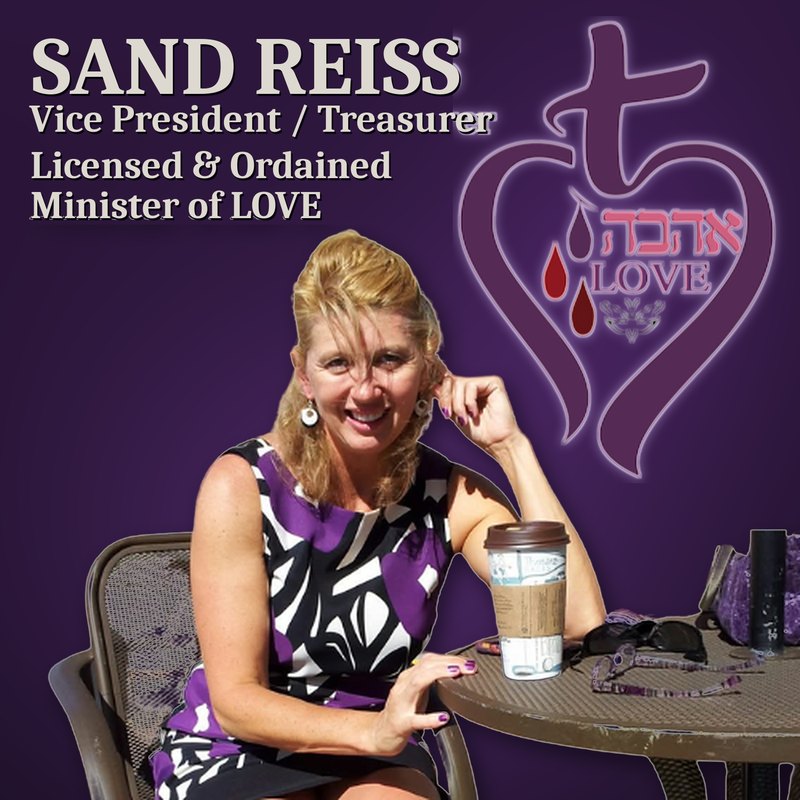 SAND REISS, Vice President / Treasurer, Licensed & Ordained Minister of LOVE, with the LOVE heart and cross logo